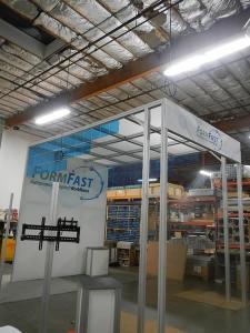 RENTAL: Island Rental with 14 ft. Tower, Lounge, Large Format Graphics, RE-1228 Curved Counter, RE-1219 Square Pedestal, and Blue Acrylic Accent Tiles and Infill Panels -- Image 2
