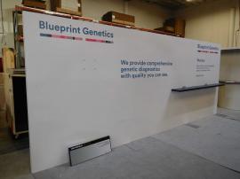 Continuous Laminated Inline Wall with Graphics, Shelf, and Monitor Mount