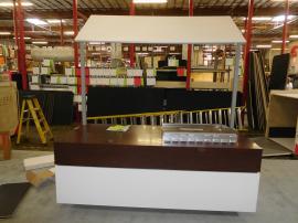 Custom Grilling Demonstration Station with Mirrored Ceiling and Storage Drawers