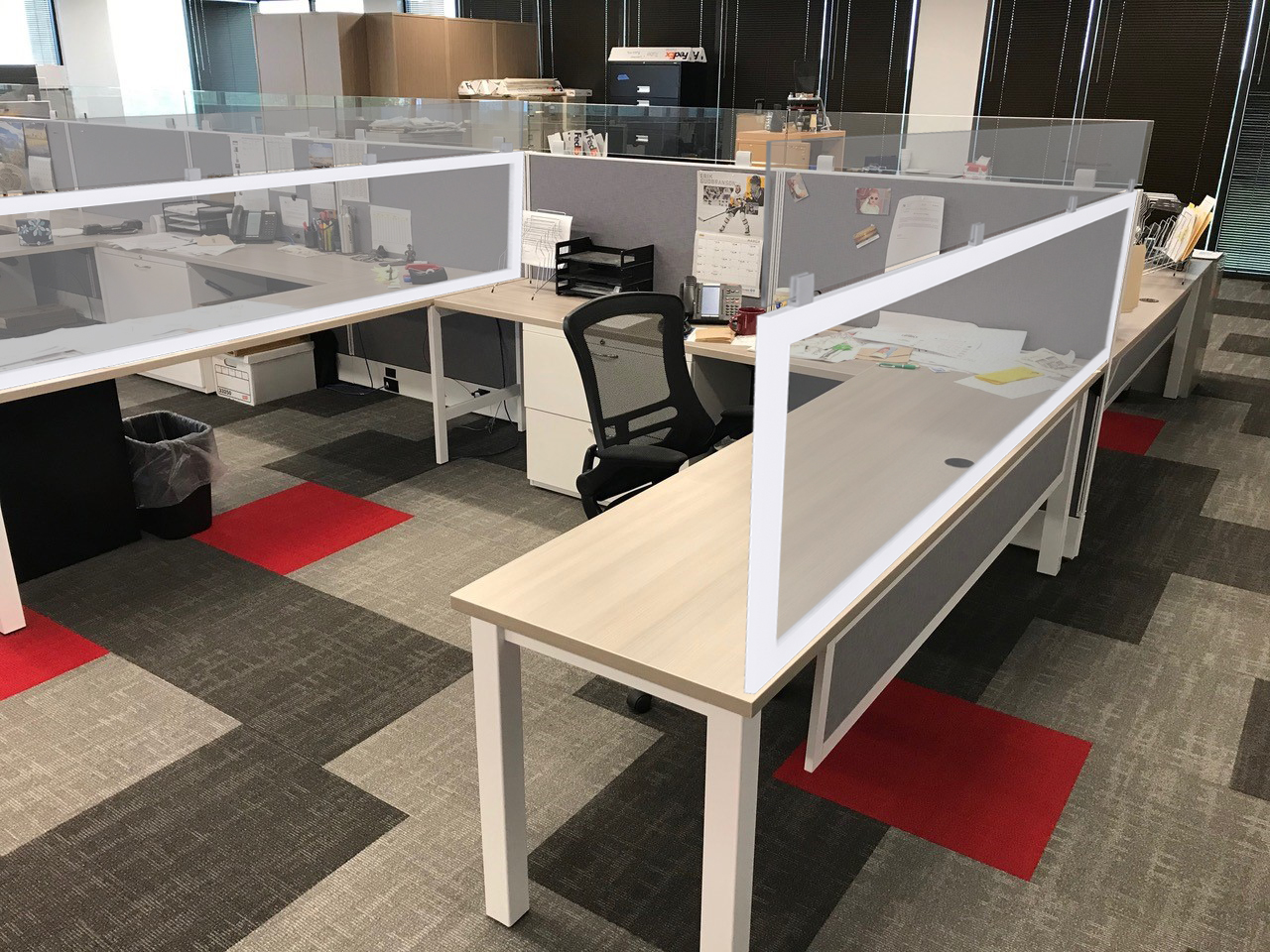 Office with plex dividers using existing desks and cubicles.